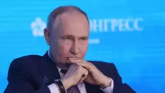 Путін