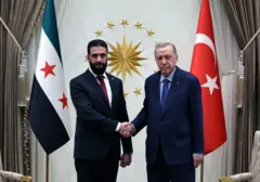 دست دادن اردوغان و شرع در آنکارا