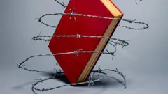 Книга в колючей проволоке
