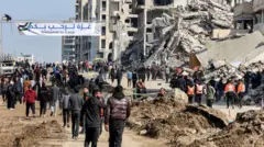 Палестинцы возвращаются на север сектора Газа после открытия блокпостов