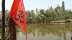 সন্দেশখালি জুড়ে এখন গেরুয়া পতাকা, যা সদ্যই লাগানো হয়েছে