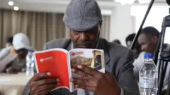Nama kitaaba dubbisaa jiru