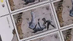 Iki gicapo kiri kuri uru ruhome cerekana umugabo asa na Perezida Vladimir Putin w‘Uburusiya atembagajwe n’agahungu gatoya mu rukino rwa judo. 