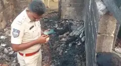 కాలిపోయిన ఇంట్లో పోలీసులు