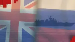 Російський та британський прапори