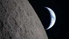 Superficie de la Luna con la Tierra de fonde