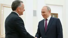 Vladimir Putin i Stiv Vitkof