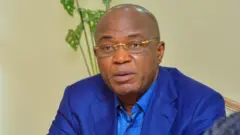 Gentiny Ngobila Mbaka yahoze ari guverineri w'intara ya Mai-Ndombe mbere y'uko mu 2019 agirwa guverineri wa Kinshasa