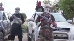Boko Haram terrorists holding guns