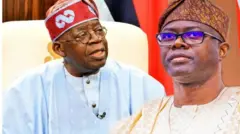 Gomina Seyi Makinde ree to jokoo lori aga gomina ipinle Oyo, o n woye pẹlu bo ṣe kawọ le tabili to wa niwaju rẹ pẹlu ẹrọ gbohùngbohùn pẹlu àwòrán Tinubu