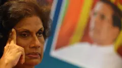 Sri Lankas former president Chandrika Kumaratunga looks on during a press conference in Colombo on December 22, 2014