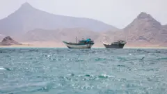 Boats float near the coast of Bab el-Mandeb, Yemen April 2, 2026.