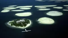 ద్వీపం, దుబాయ్, రియల్ ఎస్టేట్