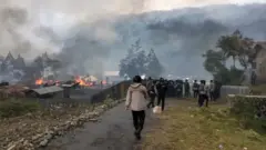 Rumah warga terbakar di Distrik Mulia, Puncak Jaya, Papua Tengah.