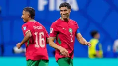 Fas ve Haiti maçında futbolcular