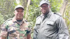 Corneille Nangaa ukuriye AFC (ibumoso) na Lawrence Kanyuka umuvugizi wayo