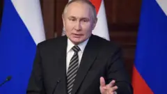 Путин