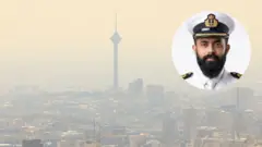 इरानको राजधानी तेहरानको पृष्ठभूमिमा अमृत झाको तस्बिर