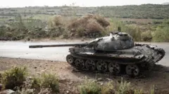 ኣብ ዝሓለፈ ኲናት ዝዓነወት ታንኪ ኣብ ብቖጥቋጥ ዝተዓጀበ ናይ ቅጥራን ጽርግያ