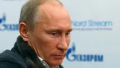 путін