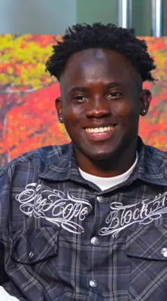 Muhammed Gilmore smiling for the camera