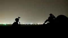 ኣባላት ደልታ ፎርስ ኣብ ጸልማት