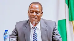 Taiwo Oyedele in suit