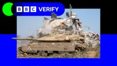 በአቧራ ውስጥ የሚንቀሳቀስ ታንክ