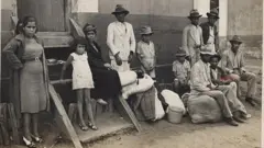 Imigrantes em hospedaria