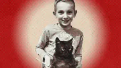 Miloš Grbić s mačkom