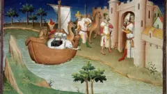 الأخوة بولو (بما في ذلك الرحالة ماركو بولو) يصلون إلى هرمز قادمين من الهند على متن سفينة محملة بالبضائع. صورة مصغرة من كتاب "رحلات ماركو بول" 