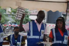 Electoral official dey count vote