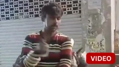 மதுபோதையில் போலீசாரிடம் பாம்பை காட்டி மிரட்டிய நபர்