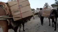 تصویر کاروان کولبران