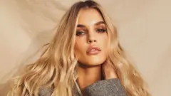 Жой Корриган сыяктуу топ моделдерге пандемия маалында Instagram аябай чоң роль ойногон