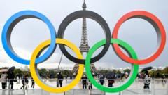 Olympic rings for Paris, wit Eiffel Tower for background