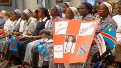 Waumini wakihudhuria sherehe ya kutangazwa kuwa Mwenyeheri Floribert Bwana Chui