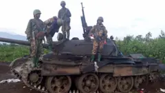 Inyeshamba za M23 hejuru y'komodoka ntamenwa c'ingabo za reta inyuma y'intabara muri Rutshuru mu mpera z'umwaka uheze 