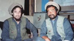 کوشیرو تاناکا د احمدشاه مسعود تر څنګ ناست دی