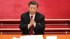 Xi