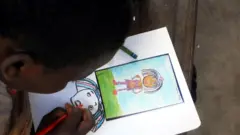 Young girl dey draw