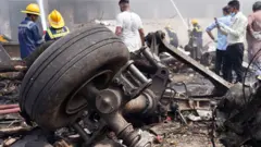 Debris at the site of a plane crash near Sardar Vallabhbhai Patel International Airport in Ahmedabad, Gujarat, western India, 12 June 2025. 