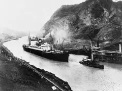 A cargo ship transits the Panama Canal