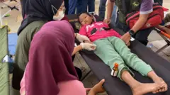 Seorang siswa menjalani perawatan usai mengkonsumsi MBG.