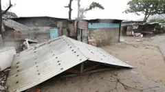 A torn off roof is seen in St. Catherine, Jamaica, on October 28, 2025. Ferocious winds and torrential rain tore into Jamaica Tuesday as Hurricane Melissa made landfall, the worst storm ever to strike the island nation and one of the most powerful hurricanes on record.