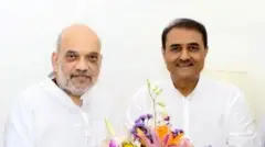 अमित शाह के साथ प्रफुल्ल पटेल 