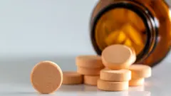 Pílulas em um recipiente