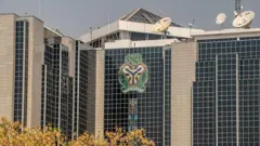 Di headquarters of di Nigerian central bank for Abuja, Nigeria.
