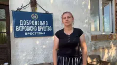 Милена Стајчић испред ватрогасног дома у селу Брестовац