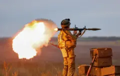Newly-mobilised Russian reservists take part in a training on a range in Donetsk region